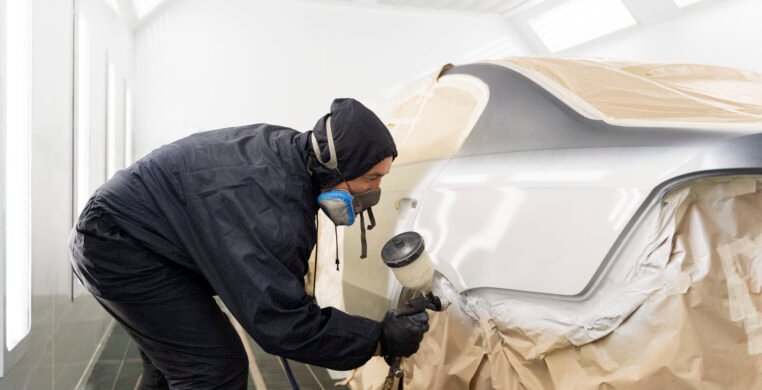 service-worker-painting-car-auto-service